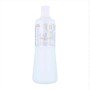 Crema Schiarente Blondor Freelight Wella WELLOXON PERFECT 1 L 6% 20 vol (1L) di Wella, Acqua ossigenata per capelli - Rif: S0...