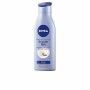 Lotion corporelle Nivea Triple Accion 400 ml (400 ml) de Nivea, Hydratants - Réf : S0589219, Prix : 7,01 €, Remise : %